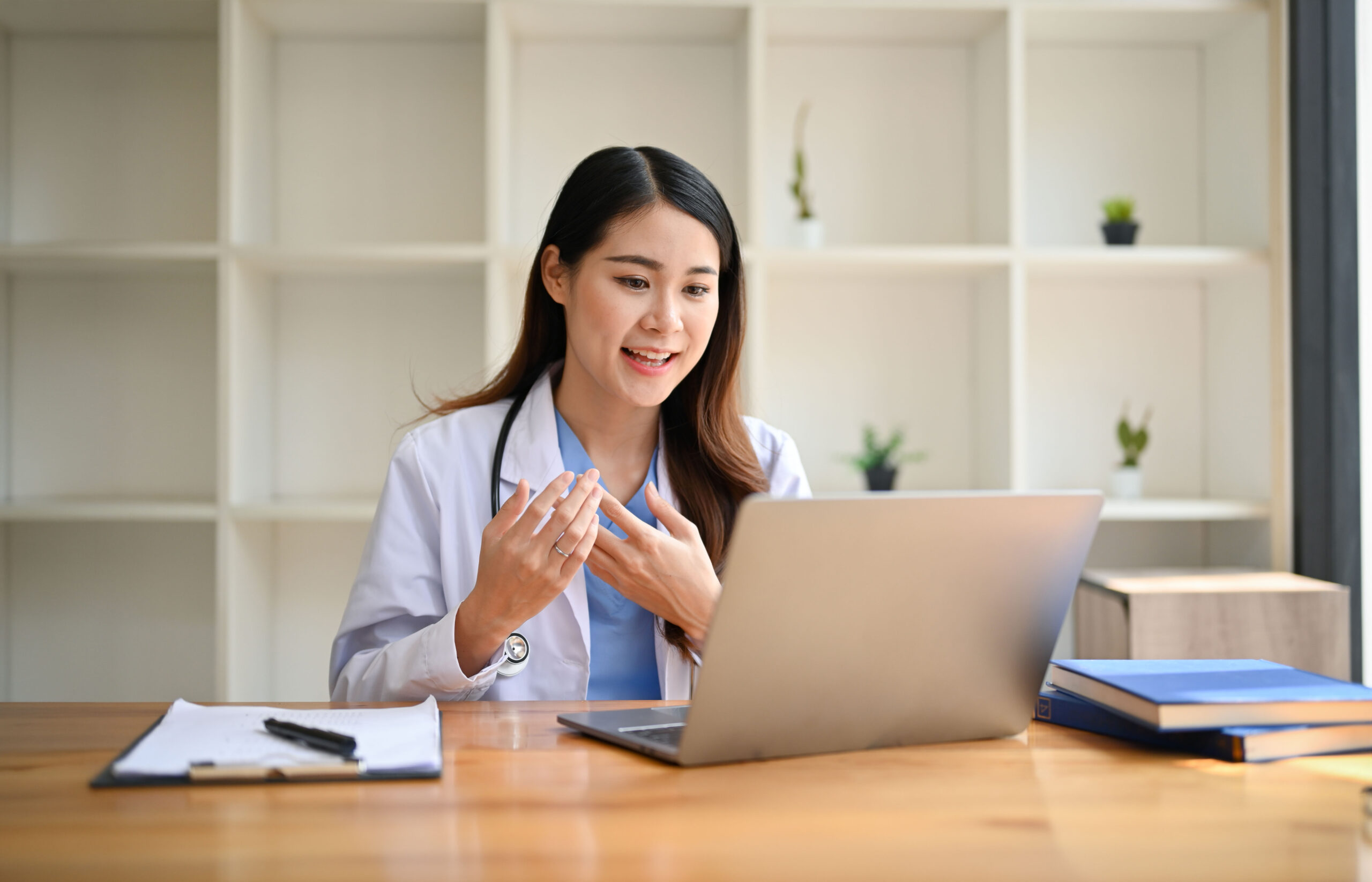 A smiling healthcare professional outdoors