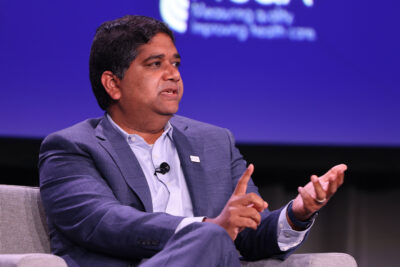 Dr. Vivek Garg speaking at a conference